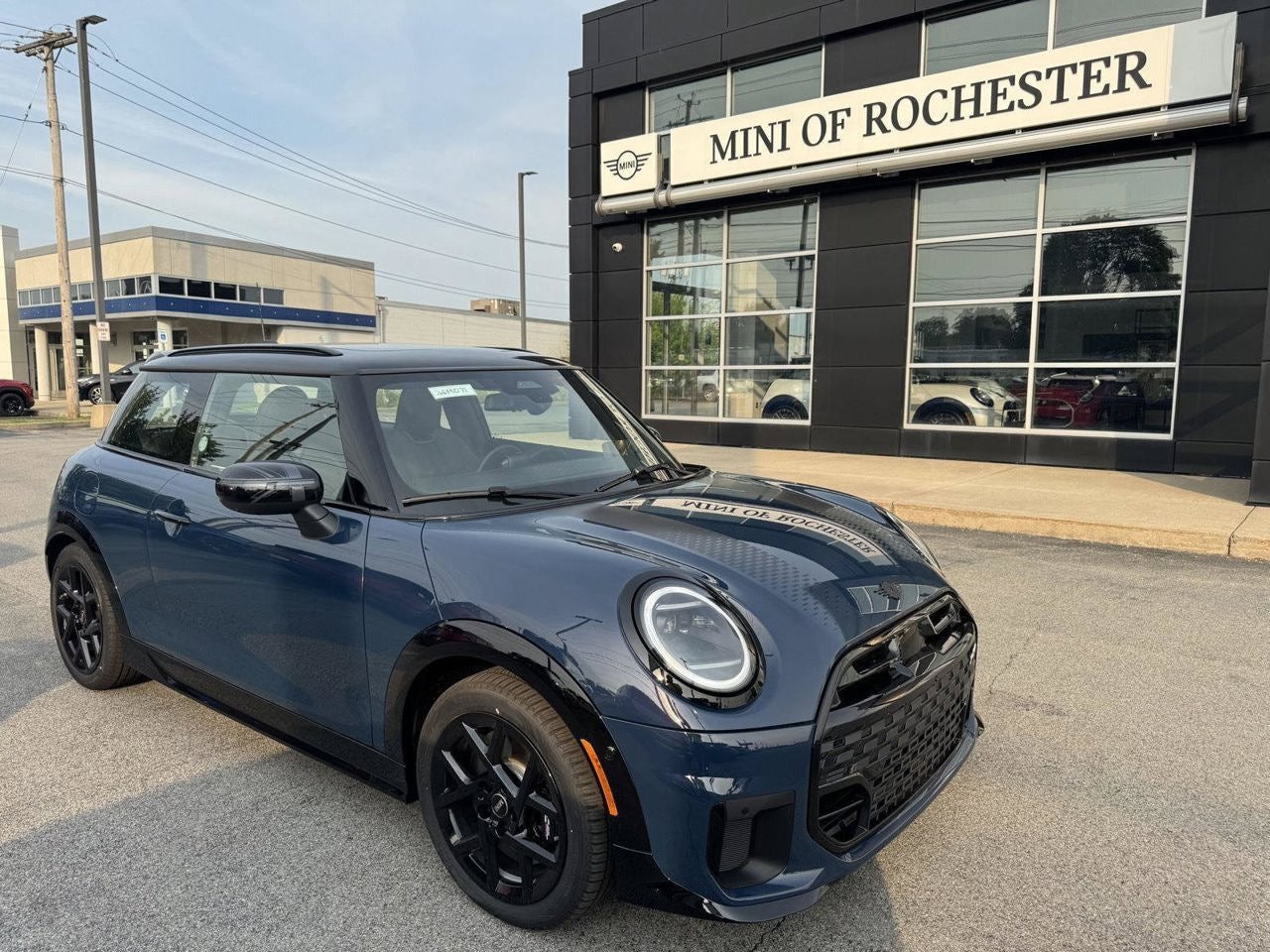 2026 MINI 2 DOOR ICONIC in Indigo Sunset Blue Metallic — front three-quarter view