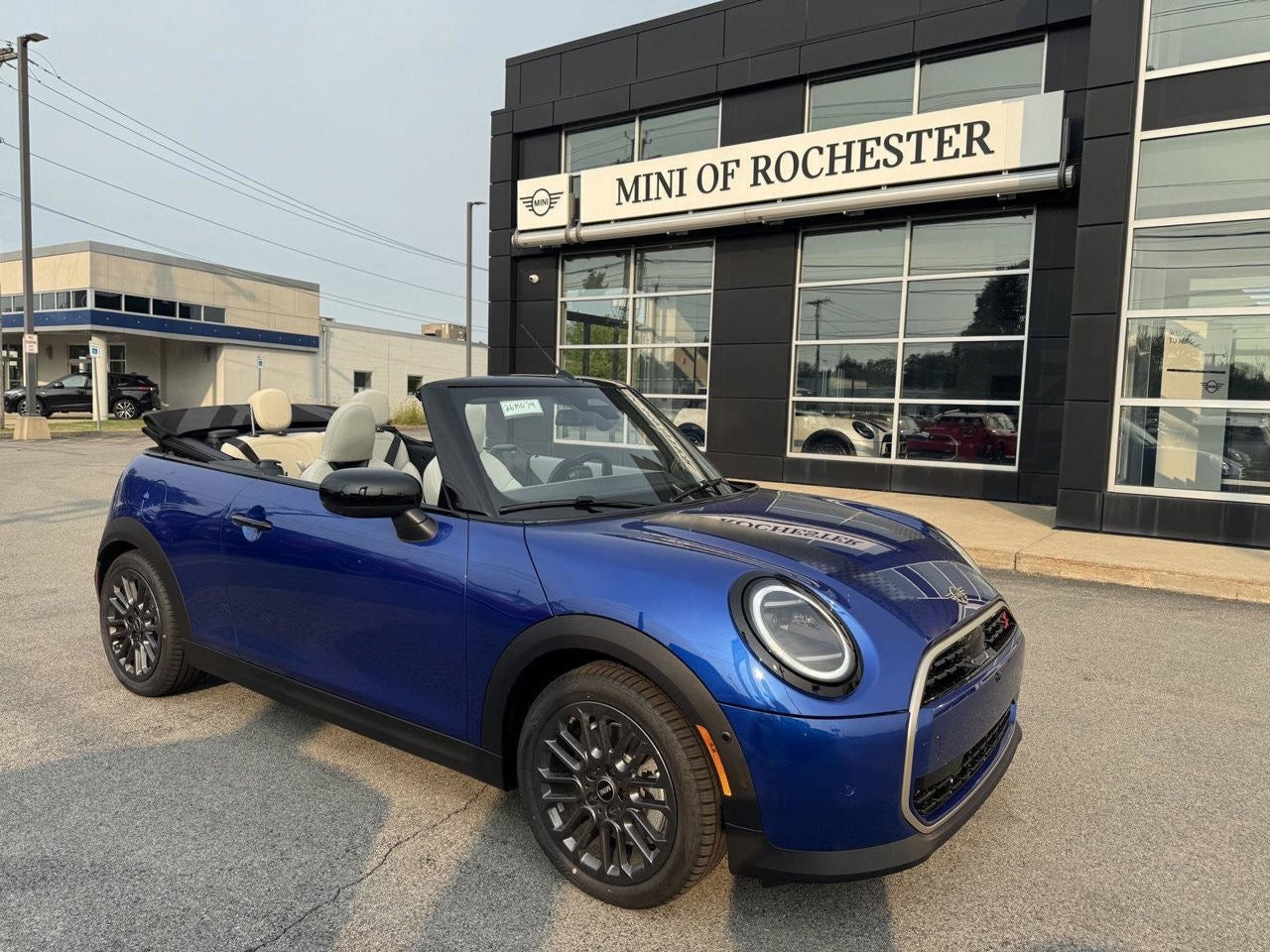 2026 MINI CONVERTIBLE ICONIC in Blazing Blue Metallic — front three-quarter view