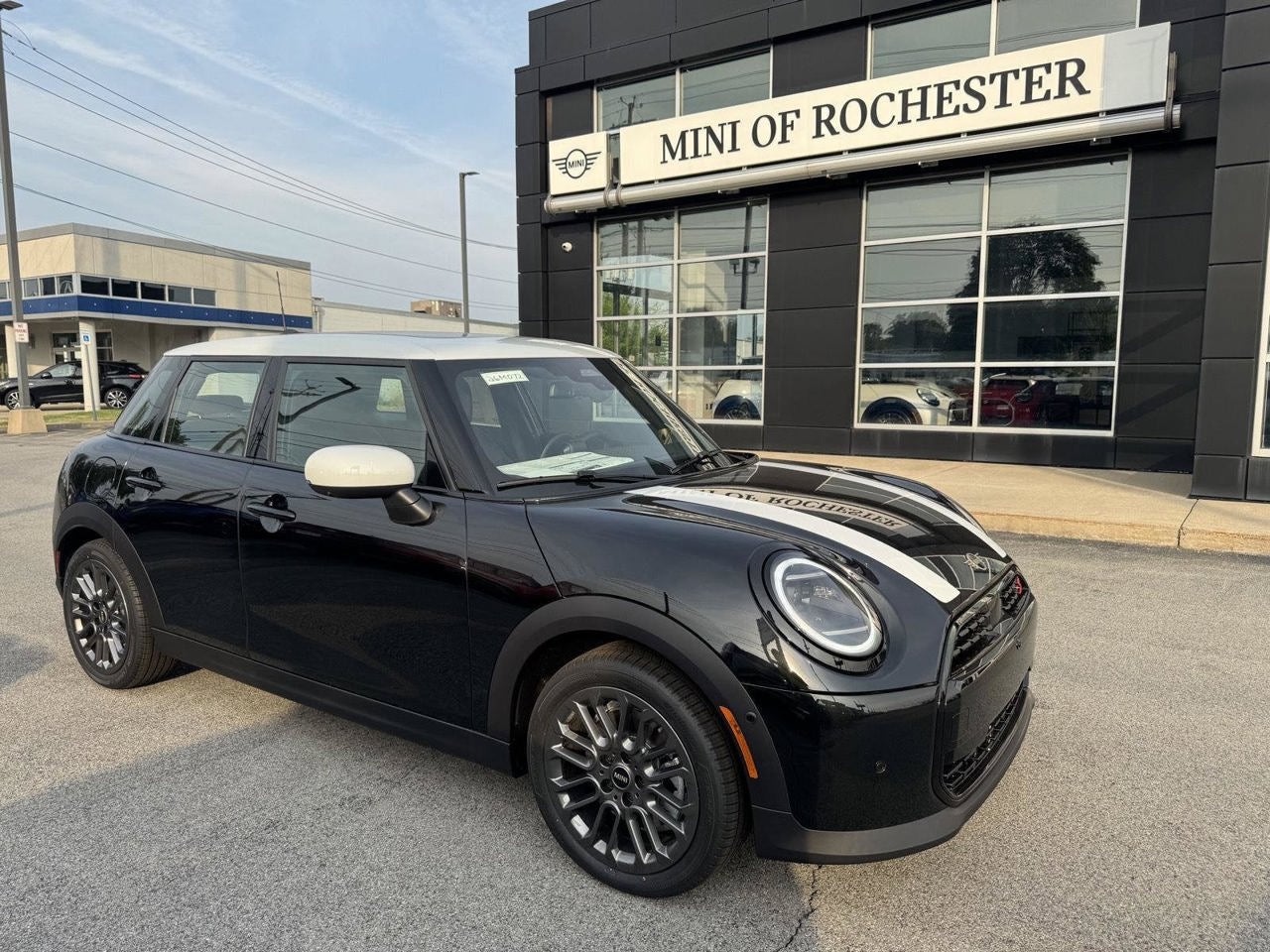 2026 MINI 4 DOOR ICONIC in Midnight Black II Metallic — front three-quarter view