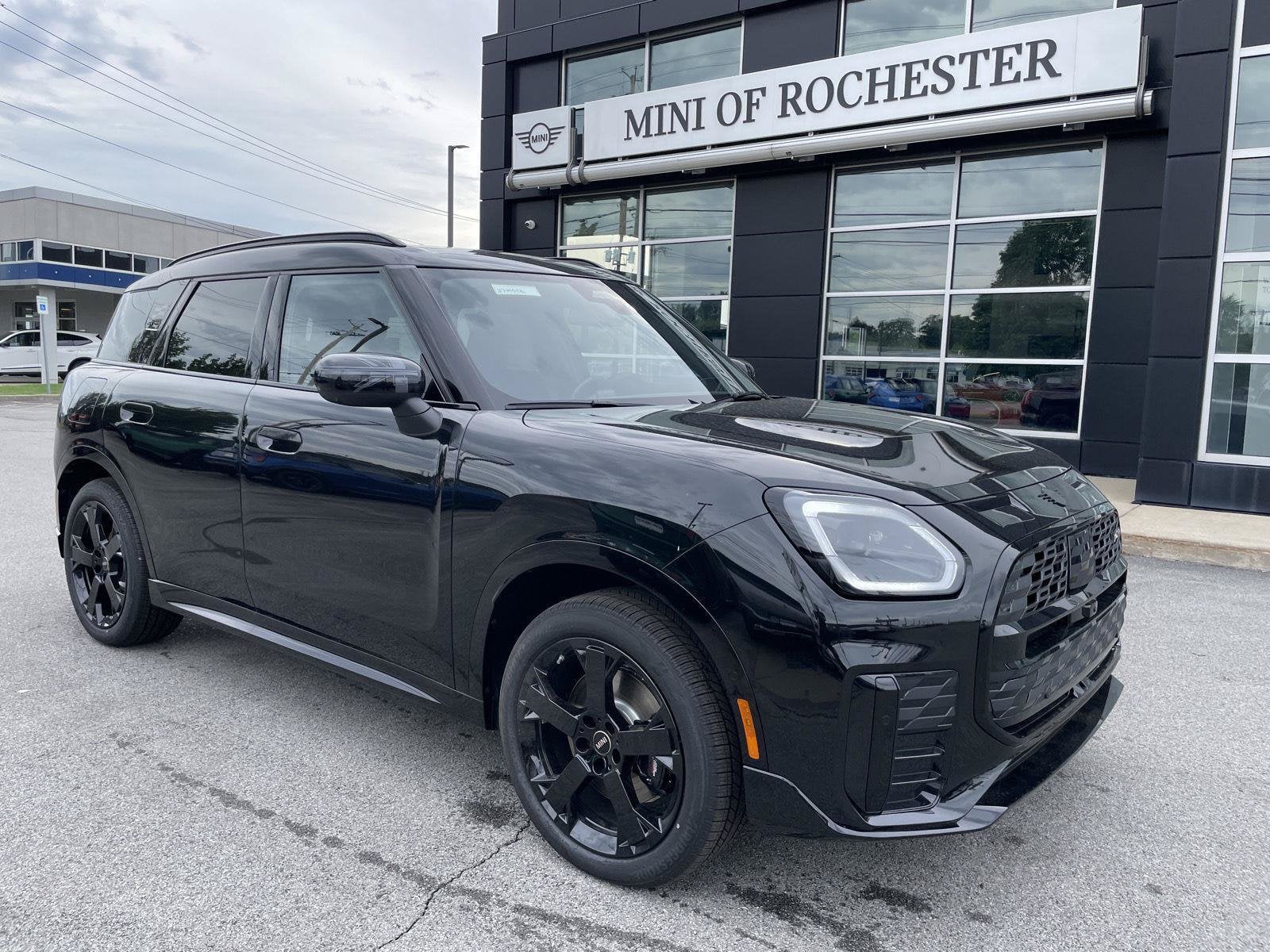 2027 MINI COUNTRYMAN ICONIC in Midnight Black II Metallic — front three-quarter view