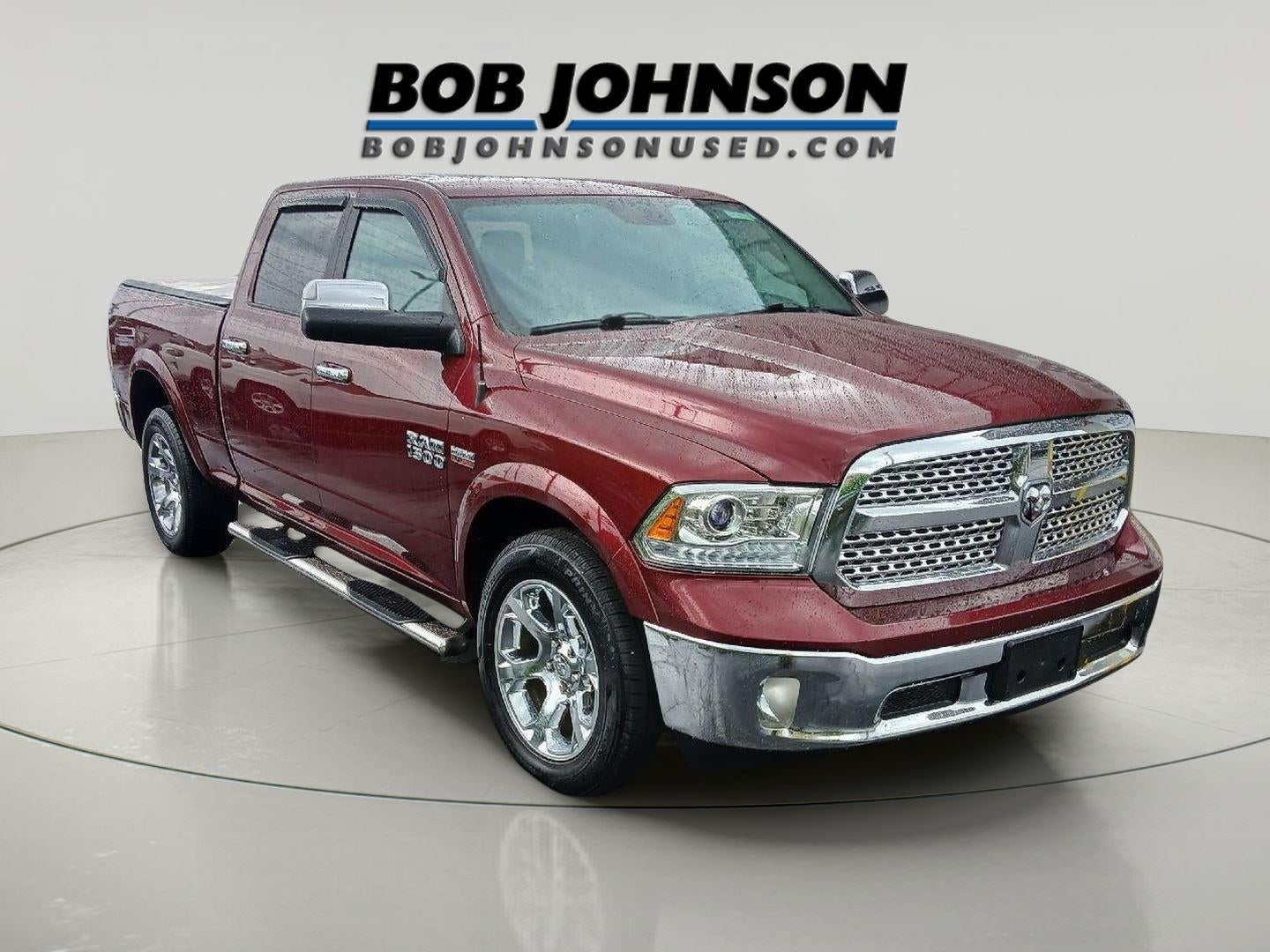 2017 RAM 1500 Laramie in Red Pearl — front three-quarter view