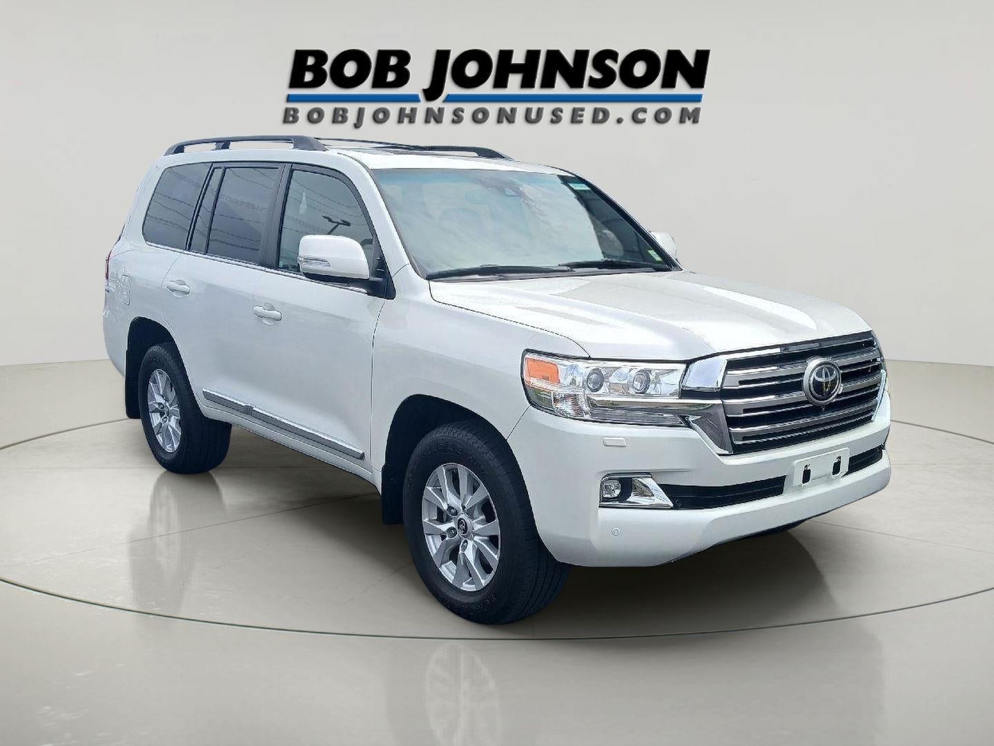 2016 Toyota Land Cruiser Base in Blizzard Pearl — front three-quarter view