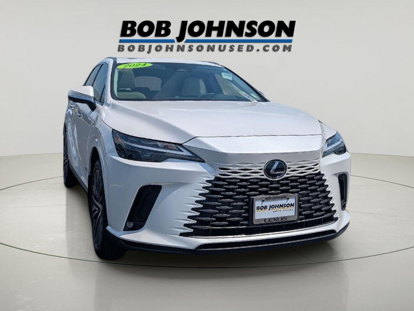 2024 Lexus RX 350h PREMIUM PLUS in Eminent White Pearl — front three-quarter view