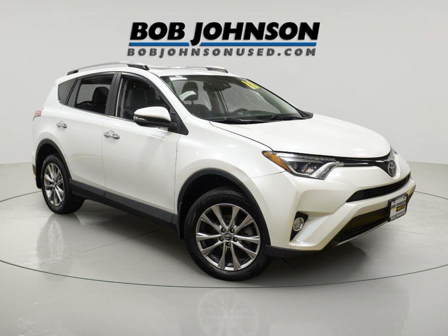 2018 Toyota RAV4 Limited in Blizzard Pearl — front three-quarter view