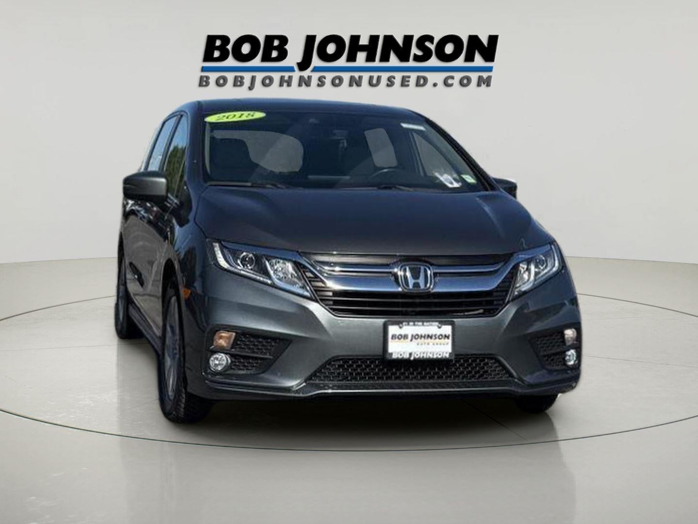 2018 Honda Odyssey SUBN in Forest Mist Metallic — front three-quarter view