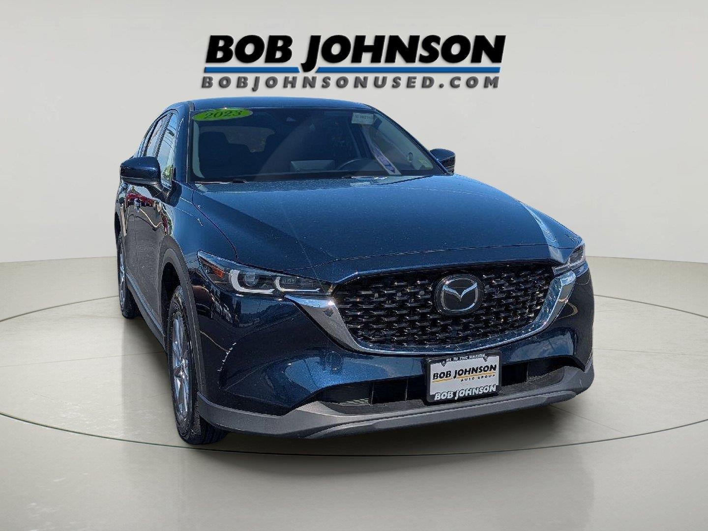 2023 Mazda Mazda CX-5 2.5 S Select Package in Deep Crystal Blue Mica — front three-quarter view