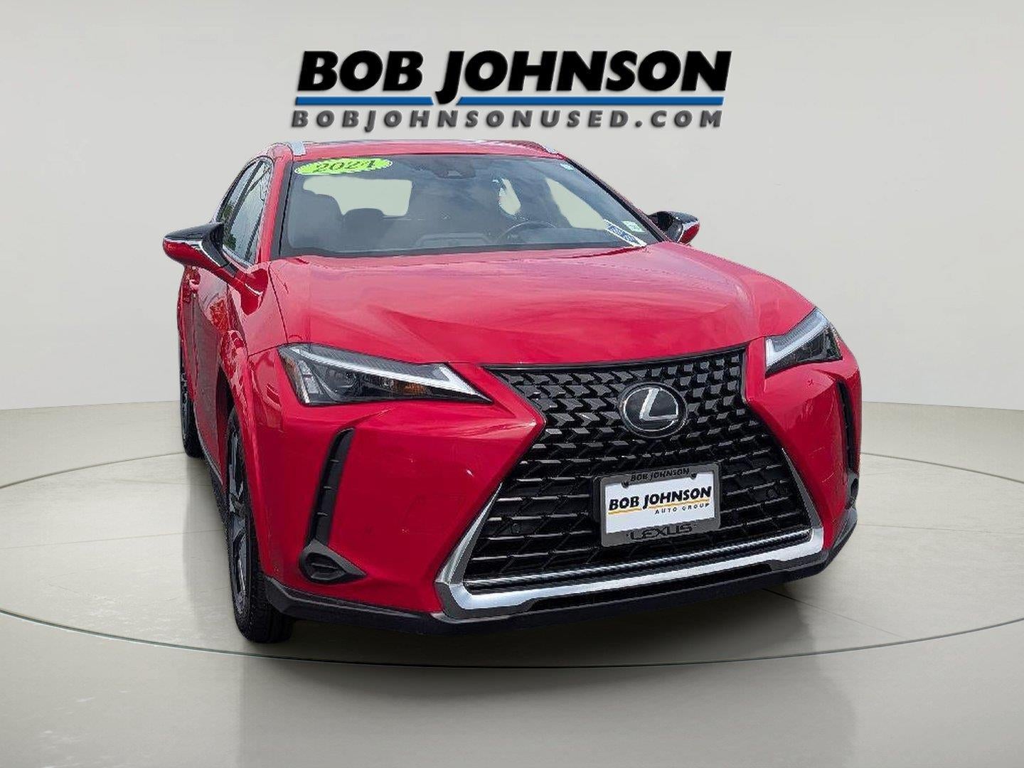 2024 Lexus UX 250h PREMIUM AWD in Madder Red — front three-quarter view