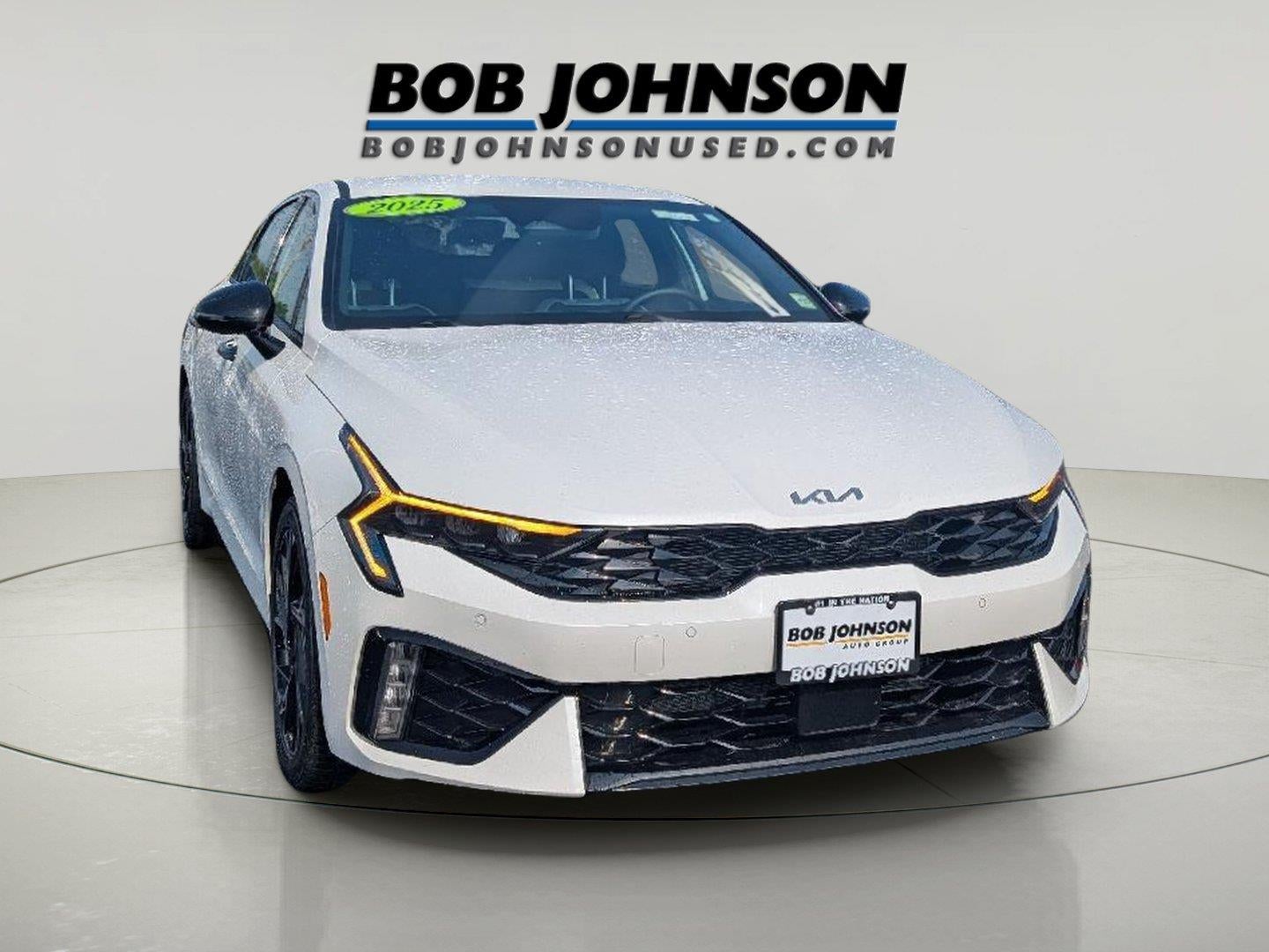 2025 Kia K5 GT-Line in Snow White Pearl — front three-quarter view