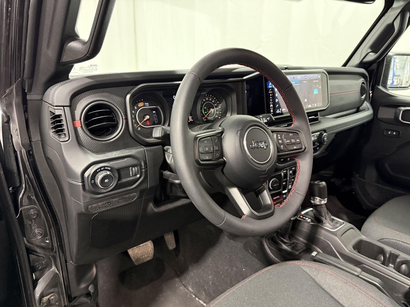 2024 Jeep Wrangler — rear three-quarter view