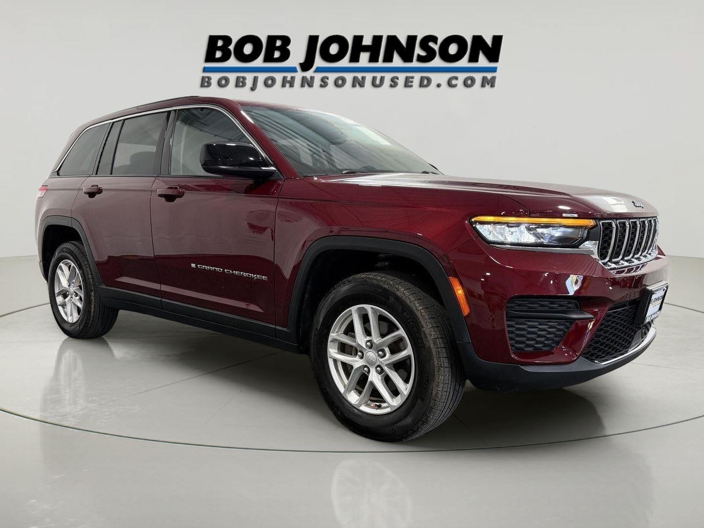 2023 Jeep Grand Cherokee Laredo 4x4 in Velvet Red Pearlcoat — front three-quarter view