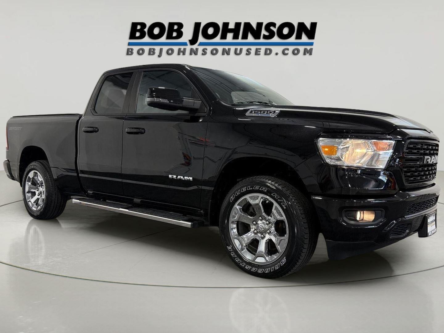 2023 RAM 1500 Big Horn Quad Cab 4x4 6'4' Box in Diamond Black Crystal Pearlcoat — front three-quarter view