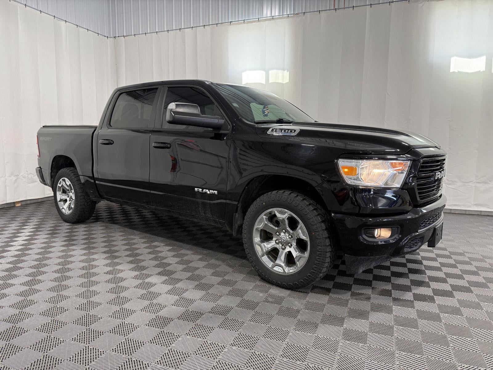 2021 RAM 1500 Big Horn Crew Cab 4x4 5'7' Box in Diamond Black Crystal Pearlcoat — front three-quarter view