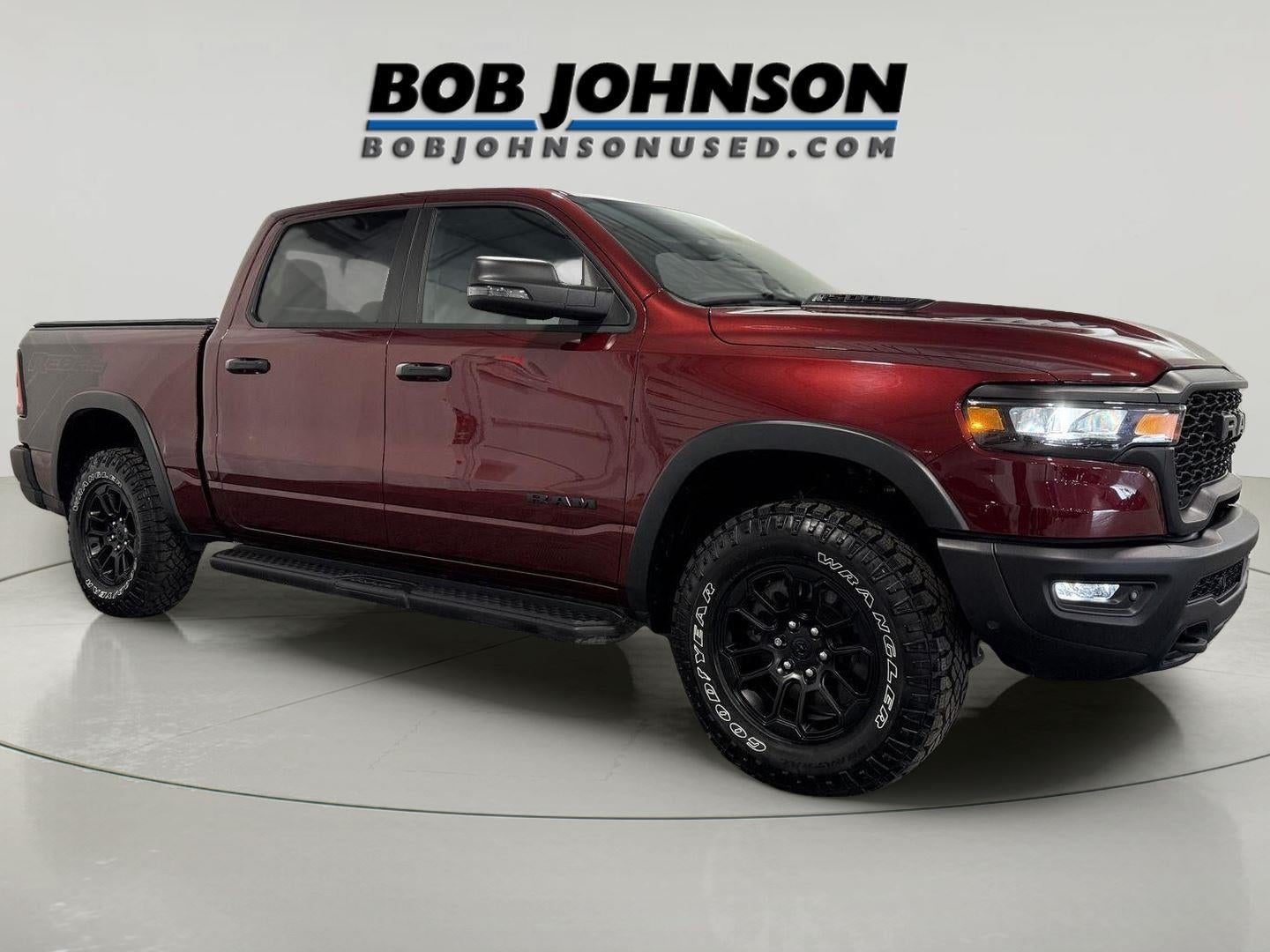 2025 RAM 1500 Rebel in Red Pearl — front three-quarter view