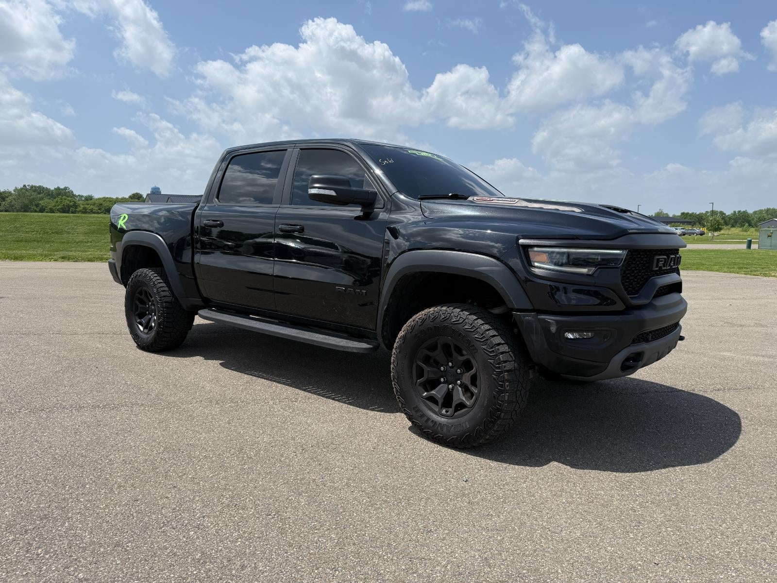 2022 RAM 1500 TRX Crew Cab 4x4 5'7' Box in Diamond Black Crystal Pearlcoat — front three-quarter view