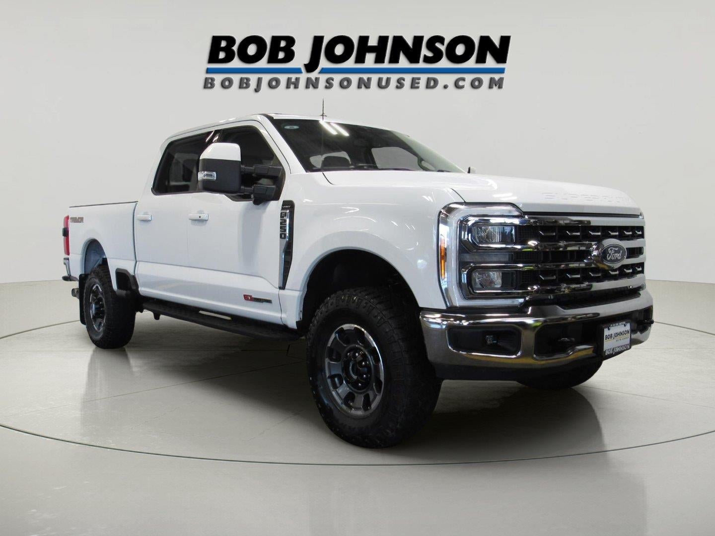 2023 Ford F-250 Lariat in Oxford White — front three-quarter view