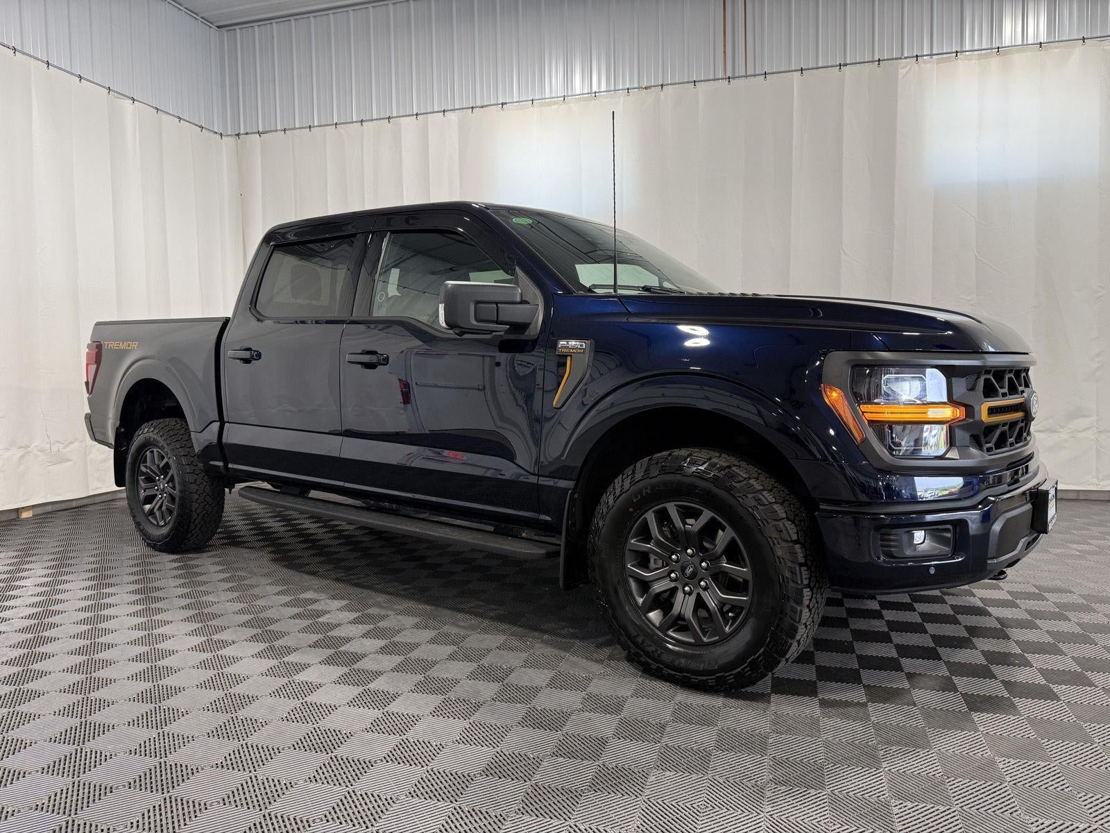 2025 Ford F-150 Tremor in Antimatter Blue — front three-quarter view