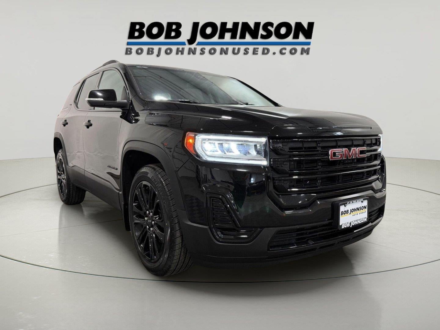 2023 GMC Acadia SLE in Ebony Twilight Metallic — front three-quarter view
