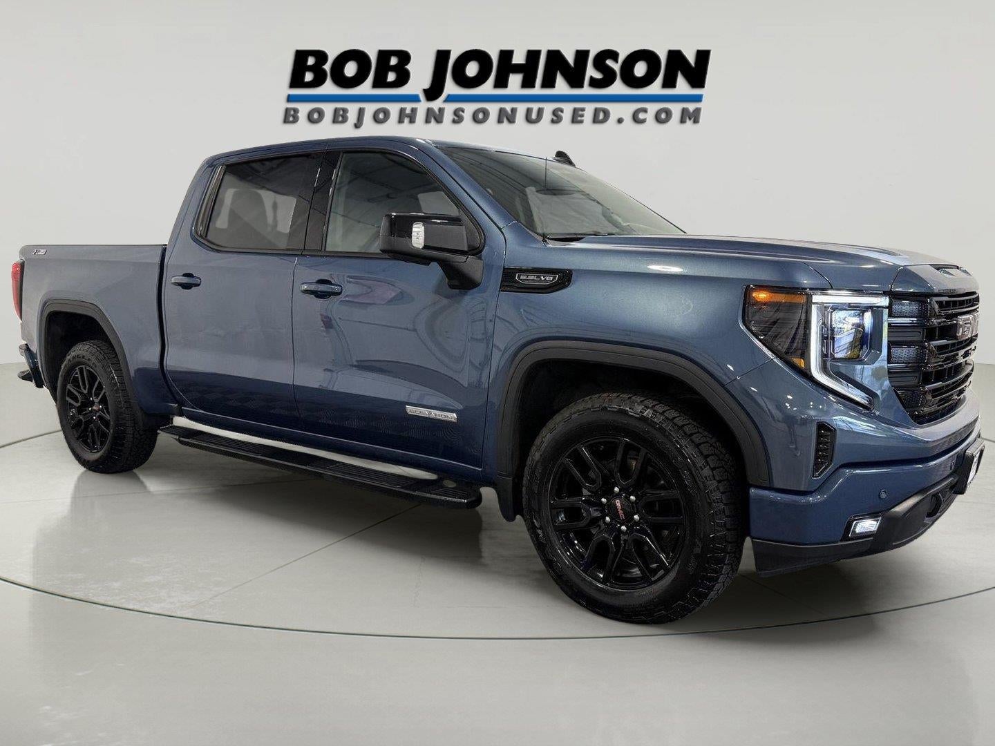 2026 GMC Sierra 1500 Crew Cab, Short Bed, Elevation, 4WD in Downpour Metallic — front three-quarter view