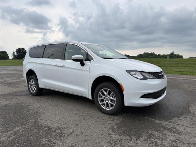 2023 Chrysler Voyager LX in Bright White Clearcoat — front three-quarter view