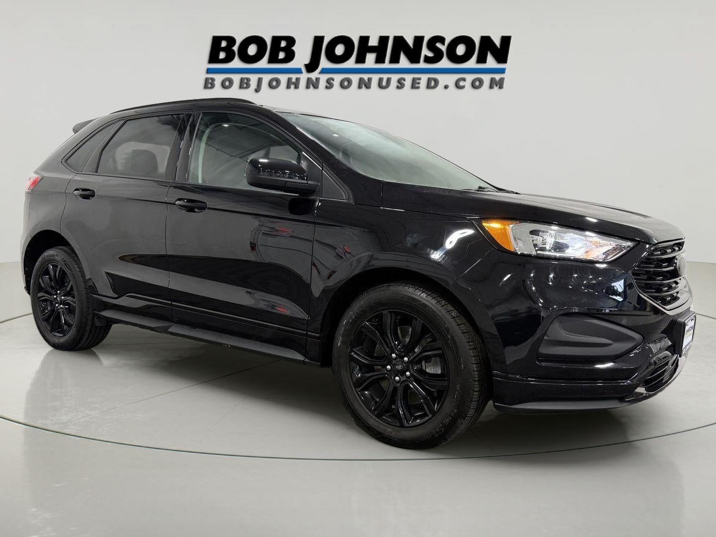 2024 Ford Edge SE in Agate Black Metallic — front three-quarter view