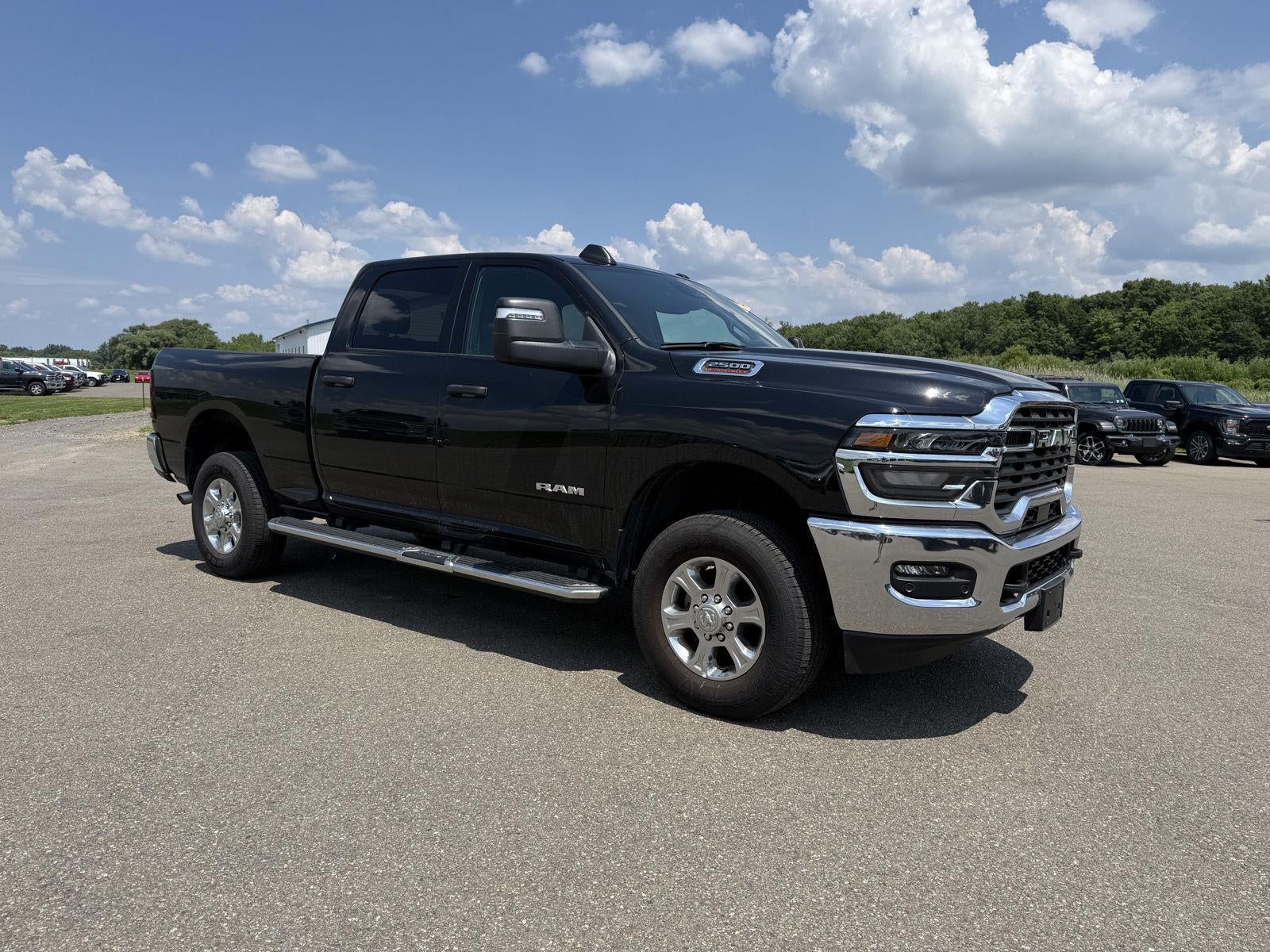 2026 RAM 2500 Big Horn in Diamond Black Crystal Pearlcoat — front three-quarter view