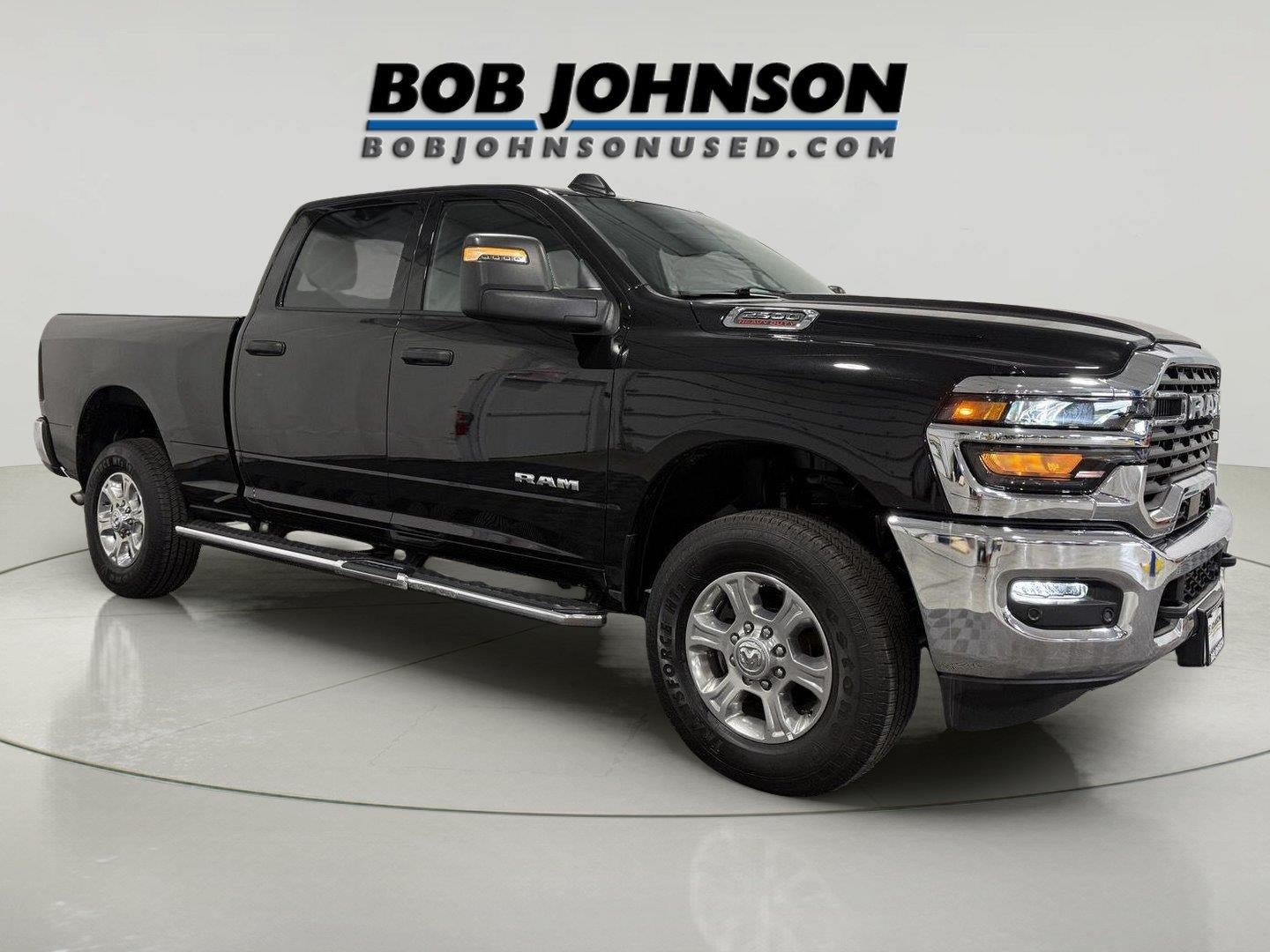 2026 RAM 2500 Big Horn in Diamond Black Crystal Pearlcoat — front three-quarter view