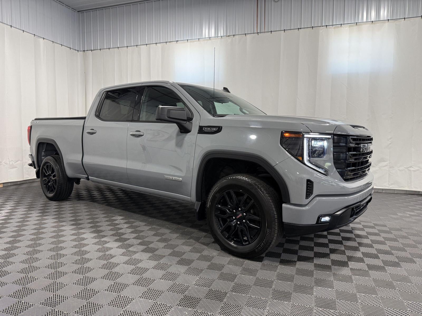 2024 GMC Sierra 1500 Elevation in Thunderstorm Grey — front three-quarter view