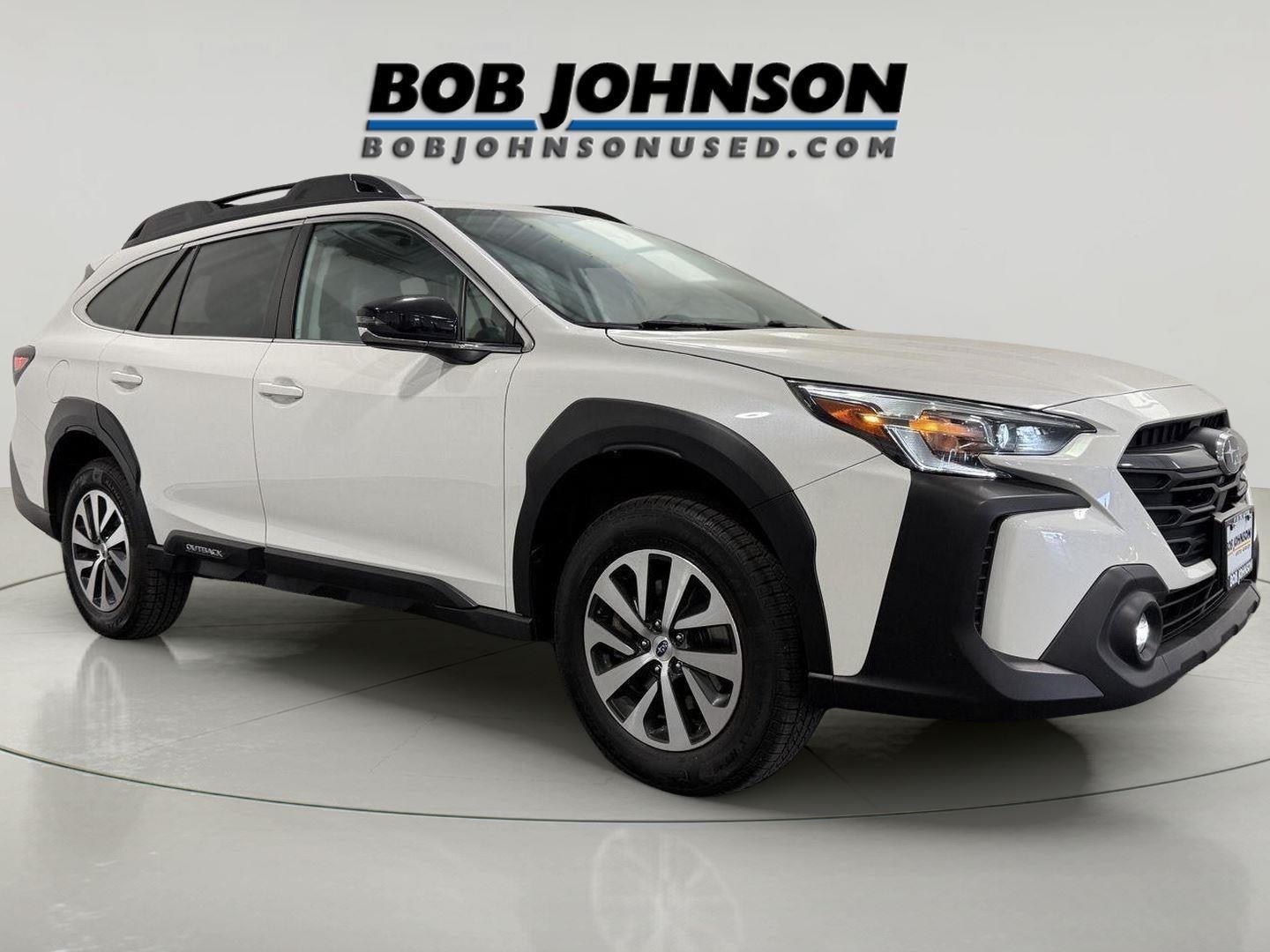 2024 Subaru Outback Premium in Crystal White Pearl — front three-quarter view