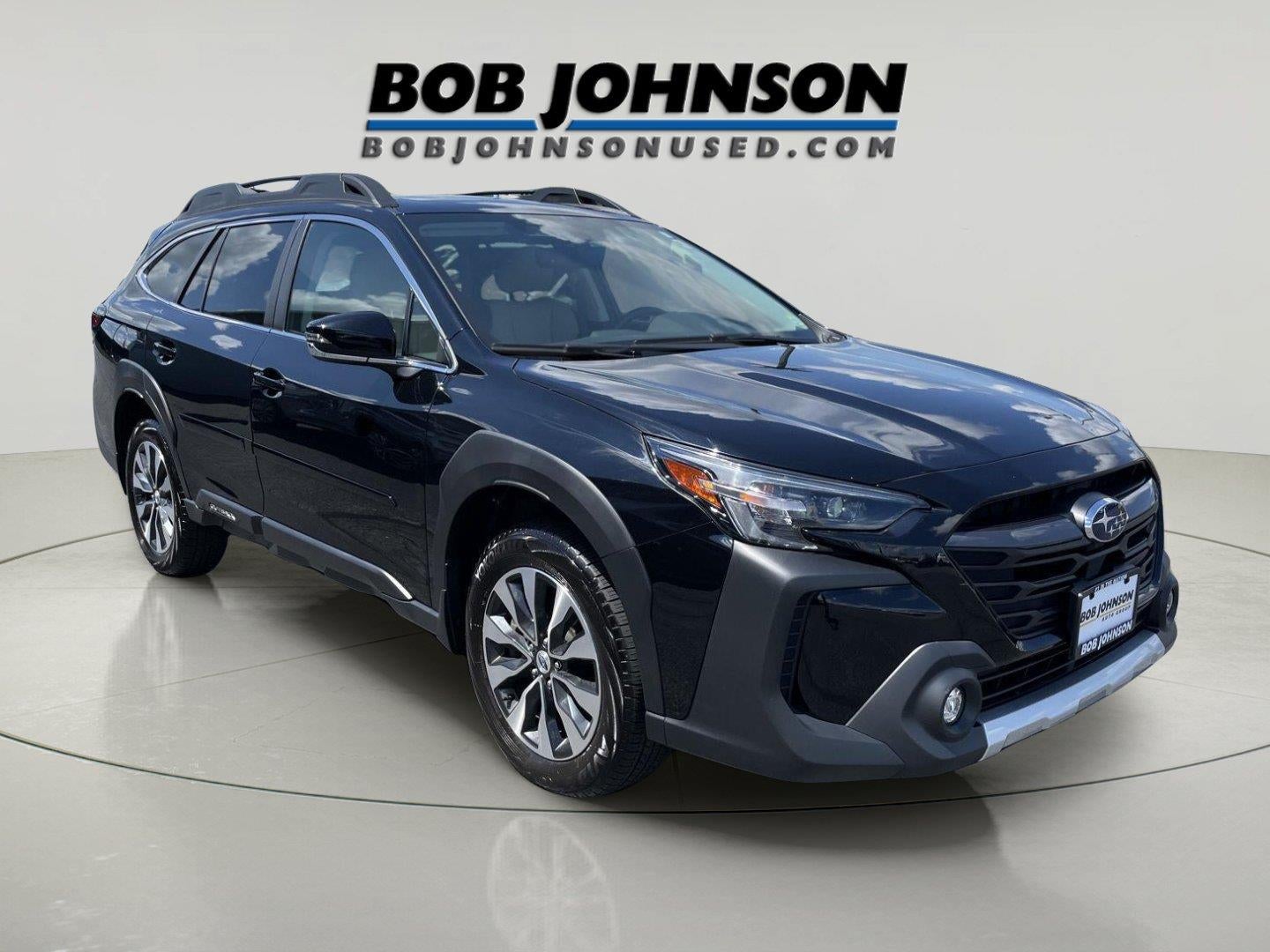 2024 Subaru Outback Limited XT in Crystal Black Silica — front three-quarter view