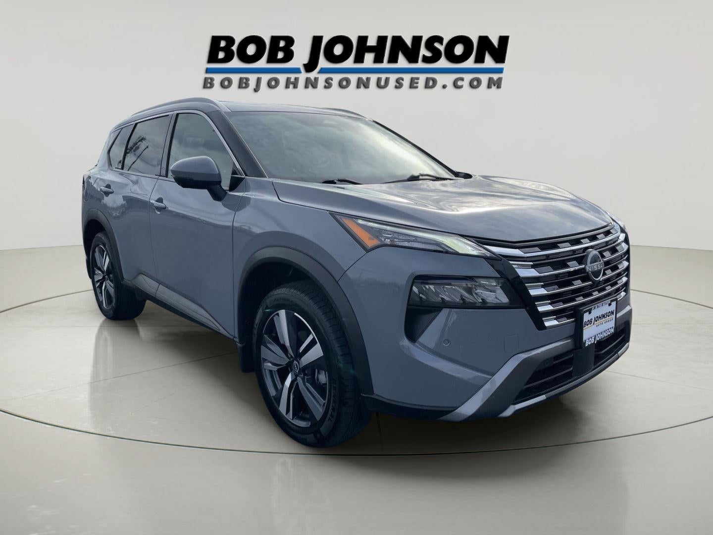 2024 Nissan Rogue SL in Boulder Gray Pearl — front three-quarter view