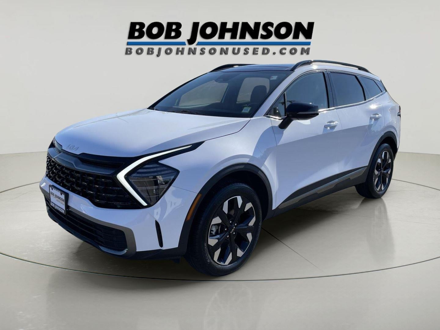 2024 Kia Sportage — rear three-quarter view
