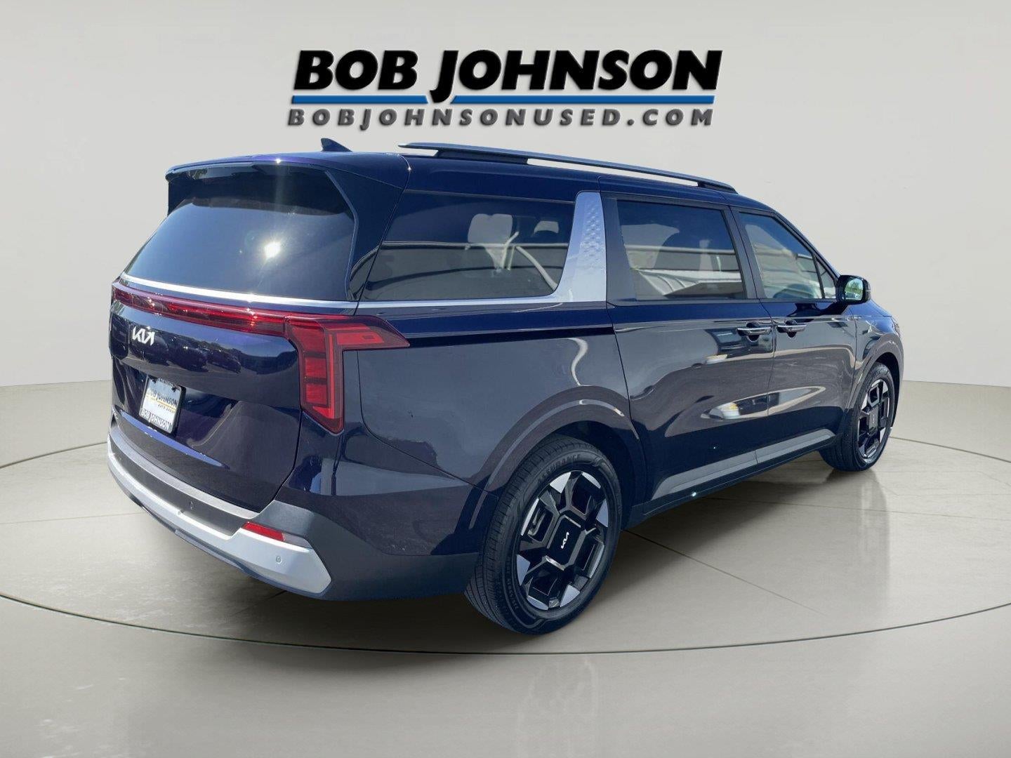 2026 Kia Carnival — rear three-quarter view