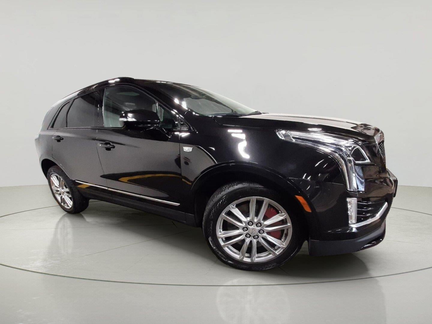 2024 Cadillac XT5 AWD Sport in Stellar Black Metallic — front three-quarter view