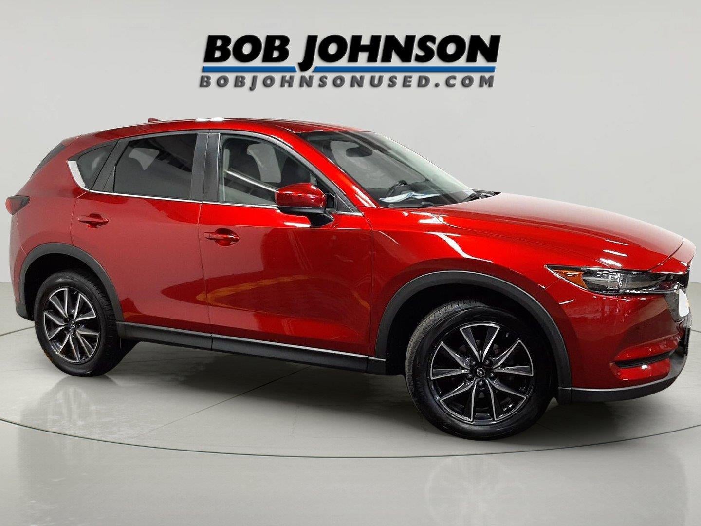 2018 Mazda Mazda CX-5 Touring in Soul Red Crystal Metallic — front three-quarter view
